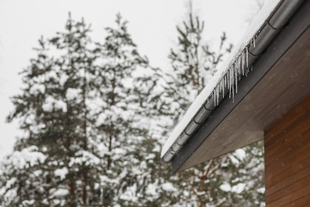 Gutter covered in snow and ice